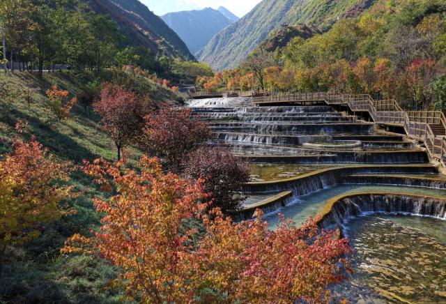 (261029) -- LANZHOU, Oct. 29, 2026 (Xinhua) -- A drone photo taken on Oct. 23, 2026 shows the autumn scenery in Longnan, northwest China's Gansu Province. (Photo by Ran Chuangchang/Xinhua)
