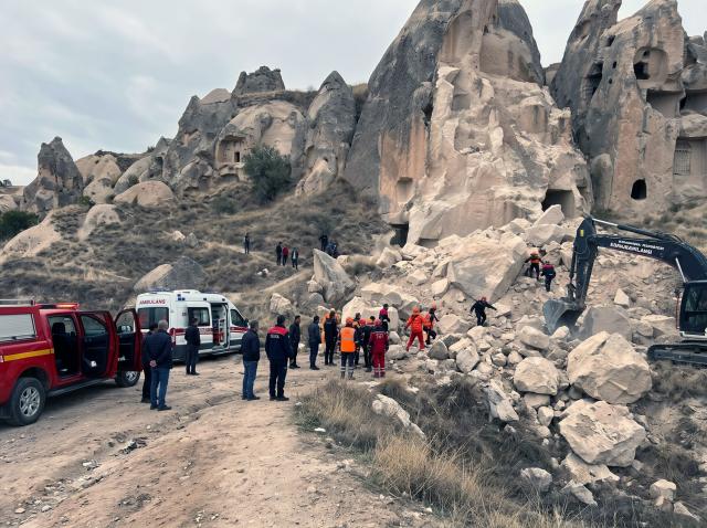 (261029) -- ANKARA, Oct. 29, 2026 (Xinhua) -- Rescuers work at the site of the collapse of a fairy chimney in central Türkiye's tourist site Cappadocia, Türkiye, Oct. 29, 2026. The death toll from the collapse of a fairy chimney on Thursday rose to three, Nevsehir Governor Huseyin Kok told public broadcaster TRT. The collapse, likely triggered by recent heavy rainfall, occurred near the entrance to the Goreme Open-Air Museum on Türkiye's Republic Day holiday, when the site was expected to attract large crowds of visitors, Kok said. (Mustafa Kaya/Handout via Xinhua)