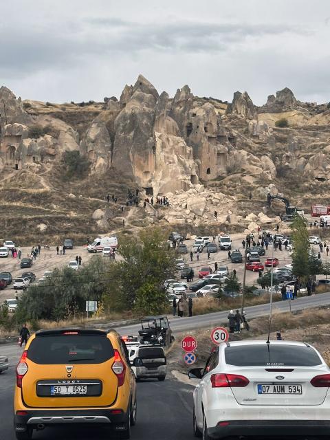 (261029) -- ANKARA, Oct. 29, 2026 (Xinhua) -- Rescuers work at the site of the collapse of a fairy chimney in central Türkiye's tourist site Cappadocia, Türkiye, Oct. 29, 2026. The death toll from the collapse of a fairy chimney on Thursday rose to three, Nevsehir Governor Huseyin Kok told public broadcaster TRT. The collapse, likely triggered by recent heavy rainfall, occurred near the entrance to the Goreme Open-Air Museum on Türkiye's Republic Day holiday, when the site was expected to attract large crowds of visitors, Kok said. (Mustafa Kaya/Handout via Xinhua)