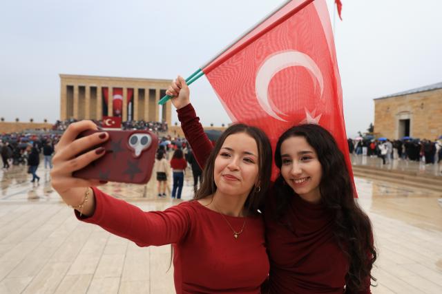 (261029) -- ANKARA, Oct. 29, 2026 (Xinhua) -- Girls take selfies at Anitkabir, the mausoleum of the founder of Turkish Republic Mustafa Kemal Ataturk, to celebrate the Republic Day in Ankara, Türkiye, Oct. 29, 2026. (Mustafa Kaya/Handout via Xinhua)