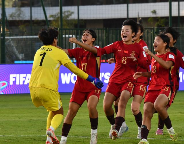 (261030) -- RABAT, Oct. 30, 2026 (Xinhua) -- China's goalkeeper Niu Ziqi (1st L) celebrates with teammates after the round of 16 match between China and France at the FIFA U-17 Women's World Cup, in Rabat, Morocco, on Oct. 29, 2026. (Photo by Aissa/Xinhua)