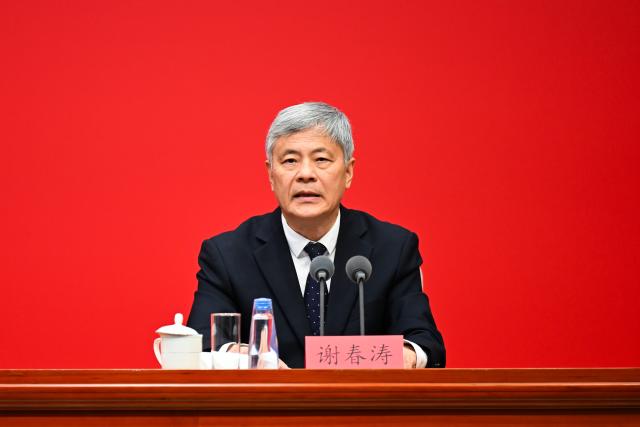 (261030) -- BEIJING, Oct. 30, 2026 (Xinhua) -- Xie Chuntao, vice president of the Party School of the Communist Party of China (CPC) Central Committee (National Academy of Governance), gives an introduction during a press conference held by the CPC Central Committee on the guiding principles from the fifth plenary session of the 20th CPC Central Committee, in Beijing, Oct. 30, 2026. (Xinhua/Zhang Xiaoyu)