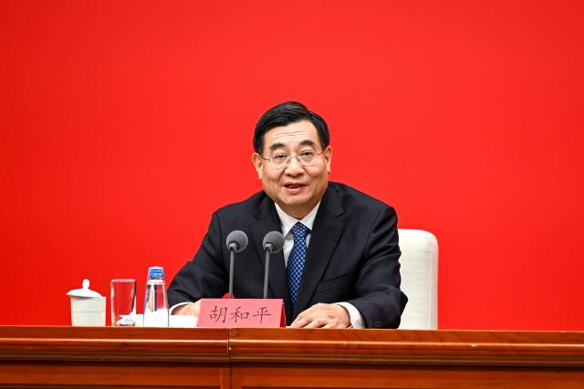 (261030) -- BEIJING, Oct. 30, 2026 (Xinhua) -- Hu Heping, deputy head of the Publicity Department of the Communist Party of China (CPC) Central Committee, gives an introduction during a press conference held by the CPC Central Committee on the guiding principles from the fifth plenary session of the 20th CPC Central Committee, in Beijing, Oct. 30, 2026. (Xinhua/Zhang Xiaoyu)