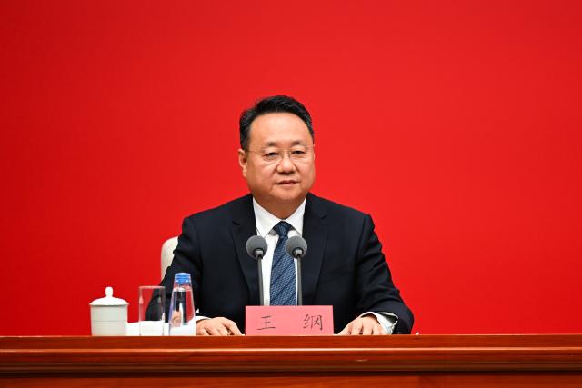 (261030) -- BEIJING, Oct. 30, 2026 (Xinhua) -- Wang Gang, deputy head of the Publicity Department of the Communist Party of China (CPC) Central Committee, presides over a press conference held by the CPC Central Committee on the guiding principles from the fifth plenary session of the 20th CPC Central Committee, in Beijing, Oct. 30, 2026. (Xinhua/Zhang Xiaoyu)