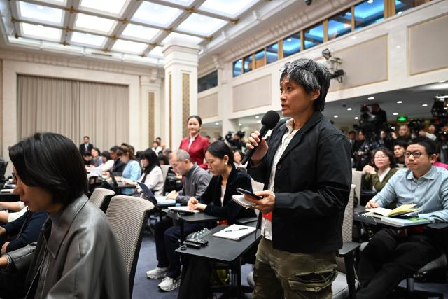 (261030) -- BEIJING, Oct. 30, 2026 (Xinhua) -- A journalist asks questions during a press conference held by the Communist Party of China (CPC) Central Committee on the guiding principles from the fifth plenary session of the 20th CPC Central Committee, in Beijing, Oct. 30, 2026. (Xinhua/Zhang Xiaoyu)