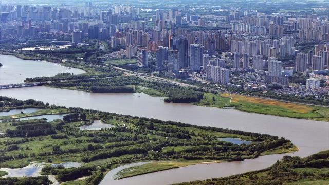 (261030) -- HARBIN, Oct. 30, 2026 (Xinhua) -- An aerial drone photo taken on July 30, 2025 shows a city view in Harbin, northeast China's Heilongjiang Province. TO GO WITH "China Focus: China's sustained housing upgrades keep urban decay at bay" (Xinhua/Wang Song)