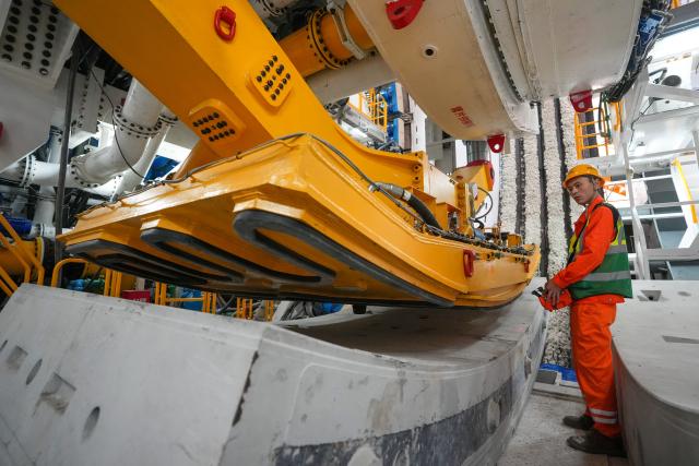 (261030) -- NANJING, Oct. 30, 2026 (Xinhua) -- A constructor works at the construction site of the Taihu Lake tunnel section of the Wuxi-Yixing S2 Line in east China's Jiangsu Province, Oct. 29, 2026. The shield-driven excavation work on the Taihu Lake tunnel section of the Wuxi-Yixing S2 Line officially began in Wuxi on Thursday.
   The 61.48-kilometer-long Wuxi-Yixing S2 Line is designed for a speed of 160 kilometers per hour and will feature nine stations, with a 21.6-kilometer-long tunnel beneath Taihu Lake. (Xinhua/Li Bo)