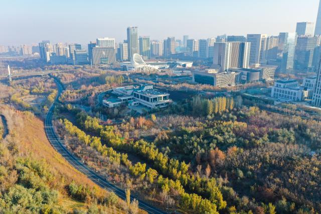 (261030) -- URUMQI, Oct. 30, 2026 (Xinhua) -- A drone photo taken on Oct. 29, 2026 shows a view of a park in Urumqi, northwest China's Xinjiang Uygur Autonomous Region.
  In recent years, various parts of Xinjiang have taken a range of measures to build ecological barriers in both urban and rural areas. While efforts are being coordinated to green barren land and restore wetlands, advanced technologies have been adopted to safeguard forests and grasslands. 
   These initiatives prove highly effective in securing and improving the ecosystem and biodiversity across the region. Specialty fruit planting and cultural tourism services are also burgeoning here. (Xinhua/Ding Lei)