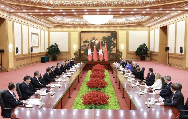 (261030) -- BEIJING, Oct. 30, 2026 (Xinhua) -- Chinese President Xi Jinping meets with President of the Swiss Confederation Guy Parmelin, who is paying a working visit to China, at the Great Hall of the People in Beijing, capital of China, Oct. 30, 2026. (Xinhua/Ding Lin)