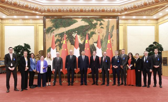 (261030) -- BEIJING, Oct. 30, 2026 (Xinhua) -- Chinese President Xi Jinping meets with President of the Swiss Confederation Guy Parmelin, who is paying a working visit to China, at the Great Hall of the People in Beijing, capital of China, Oct. 30, 2026. (Xinhua/Ding Lin)