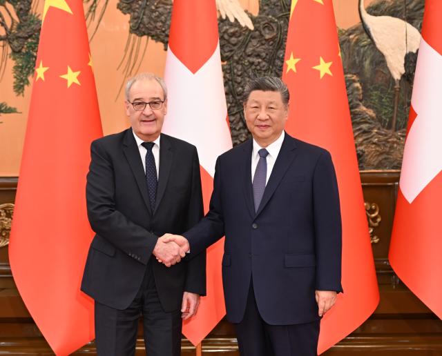 (261030) -- BEIJING, Oct. 30, 2026 (Xinhua) -- Chinese President Xi Jinping meets with President of the Swiss Confederation Guy Parmelin, who is paying a working visit to China, at the Great Hall of the People in Beijing, capital of China, Oct. 30, 2026. (Xinhua/Li Xiang)