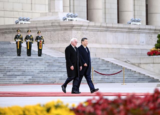 (261030) -- BEIJING, Oct. 30, 2026 (Xinhua) -- Chinese President Xi Jinping holds a welcome ceremony for German President Frank-Walter Steinmeier at the square outside the east gate of the Great Hall of the People prior to their talks in Beijing, capital of China, Oct. 30, 2026. Xi held talks with Steinmeier, who is on a state visit to China, in Beijing on Friday. (Xinhua/Yin Bogu)