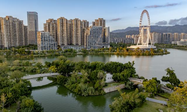 (261030) -- FUZHOU, Oct. 30, 2026 (Xinhua) -- An aerial drone photo taken on Oct. 20, 2026 shows the scenery in the Jin'an Lake Park in Fuzhou, southeast China's Fujian Province. Fuzhou, located on the coast of the East China Sea and the banks of the Minjiang River, is a renowned historical city with a history of over 2,200 years. Relying on its natural endowments and cultural heritage, Fuzhou has coordinated urban renewal, ecological governance, cultural heritage preservation and other aspects to promote high-quality and sustainable urban development. (Xinhua/Wei Peiquan)