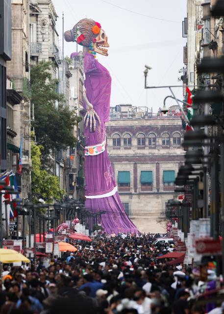 (261030) -- MEXICO CITY, Oct. 30, 2026 (Xinhua) -- A Catrina sculpture is seen at the Day of the Dead offering at Zocalo Square in Mexico City, capital of Mexico, Oct. 29, 2026. (Xinhua/Alejandro Medina)