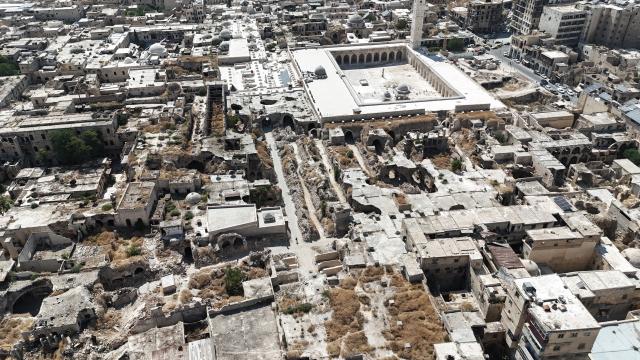 (261030) -- ALEPPO, Oct. 30, 2026 (Xinhua) -- This aerial drone photo taken on July 20, 2026 shows the historic markets and surrounding buildings in the Old City of Aleppo, northern Syria. TO GO WITH "Feature: Stones, craft and commerce -- reviving Aleppo's ancient souks" (Photo by Monsef Memari/Xinhua)