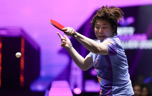 (261031) -- MONTPELLIER, Oct. 31, 2026 (Xinhua) -- Kuai Man of China hits a return during the women's singles round of 16 match between Kuai Man of China and Adriana Diaz of Puerto Rico at the WTT Champions Montpellier 2026 in Montpellier, France, on Oct. 30, 2026. (Xinhua/Wu Huiwo)