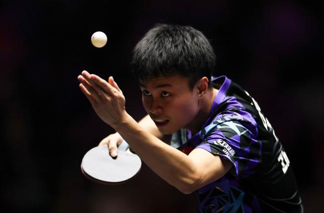 (261031) -- MONTPELLIER, Oct. 31, 2026 (Xinhua) -- Zhou Qihao of China serves during the men's singles round of 16 match between Zhou Qihao of China and Felix Lebrun of France at the WTT Champions Montpellier 2026 in Montpellier, France, on Oct. 30, 2026. (Xinhua/Wu Huiwo)
