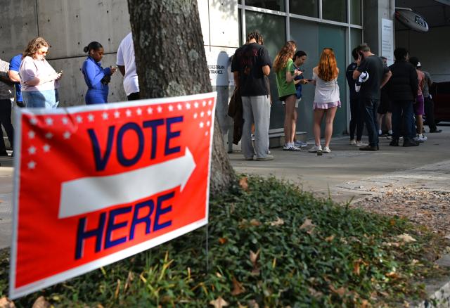 (261031) -- ATLANTA, Oct. 31, 2026 (Xinhua) -- Voters line up at a polling station for early voting in Atlanta, Georgia, the United States, on Oct. 30, 2026, days before the U.S. Midterm Election Day, which falls on Nov. 3. (Xinhua/Li Rui)