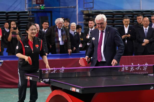 (261031) -- BEIJING, Oct. 31, 2026 (Xinhua) -- German President Frank-Walter Steinmeier plays table tennis at Peking University in Beijing, capital of China, Oct. 29, 2026. Steinmeier paid a state visit to China from Oct. 27 to 31. Besides Beijing, Steinmeier also visited Anhui Province. (Xinhua/Ma Xiaodong)