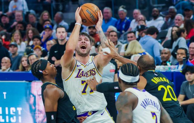 (261031) -- SAN FRANCISCO, Oct. 31, 2026 (Xinhua) -- Luka Doncic (top) of Los Angeles Lakers competes during the 2026-2027 NBA Cup group match between Golden State Warriors and Los Angeles Lakers in San Francisco, the United States, Oct. 30, 2026. (Photo by Arthur Dong/Xinhua)