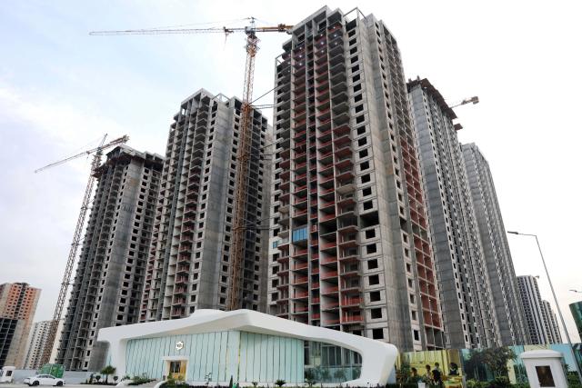 (261031) -- BAGHDAD, Oct. 31, 2026 (Xinhua) -- This photo taken on Oct. 23, 2026 shows high-rise residential complexes under construction in Baghdad, Iraq. October 31 marks World Cities Day. (Xinhua/Khalil Dawood)