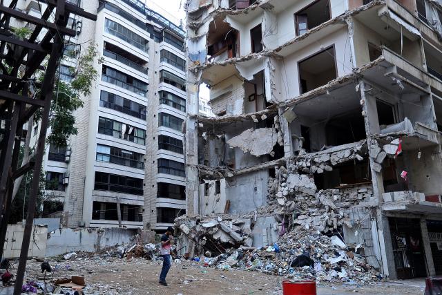 (261031) -- BEIRUT, Oct. 31, 2026 (Xinhua) -- This photo taken on Oct. 29, 2026 shows a building destroyed by war in Beirut, Lebanon. October 31 marks World Cities Day. In recent years, some cities across the Middle East have been battered by war. Buildings have been damaged, infrastructure destroyed, and once-bustling streets and houses have been reduced to rubble. War has not only transformed the urban landscape but also profoundly affected the daily lives of local residents. (Xinhua/Bilal Jawich)
