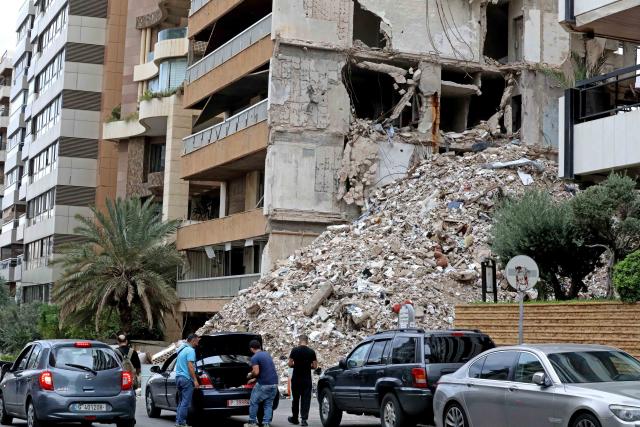 (261031) -- BEIRUT, Oct. 31, 2026 (Xinhua) -- This photo taken on Oct. 29, 2026 shows a building destroyed by war in Beirut, Lebanon. October 31 marks World Cities Day. In recent years, some cities across the Middle East have been battered by war. Buildings have been damaged, infrastructure destroyed, and once-bustling streets and houses have been reduced to rubble. War has not only transformed the urban landscape but also profoundly affected the daily lives of local residents. (Xinhua/Bilal Jawich)