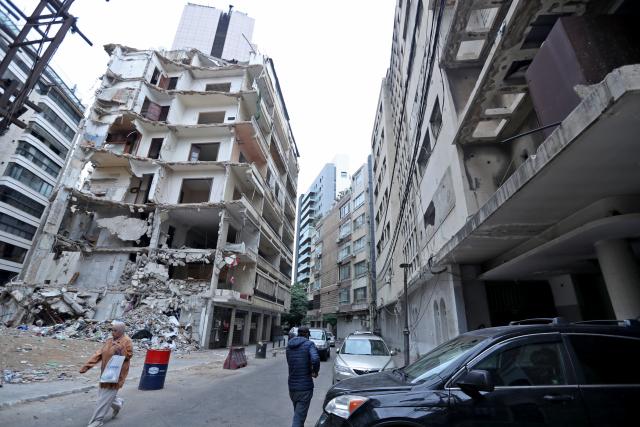 (261031) -- BEIRUT, Oct. 31, 2026 (Xinhua) -- This photo taken on Oct. 29, 2026 shows a building destroyed by war in Beirut, Lebanon. October 31 marks World Cities Day. In recent years, some cities across the Middle East have been battered by war. Buildings have been damaged, infrastructure destroyed, and once-bustling streets and houses have been reduced to rubble. War has not only transformed the urban landscape but also profoundly affected the daily lives of local residents. (Xinhua/Bilal Jawich)