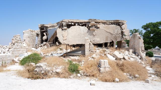 (261031) -- ALEPPO, Oct. 31, 2026 (Xinhua) -- A damaged building inside Aleppo Citadel is seen in Aleppo, Syria, July 20, 2026. October 31 marks World Cities Day. In recent years, some cities across the Middle East have been battered by war. Buildings have been damaged, infrastructure destroyed, and once-bustling streets and houses have been reduced to rubble. War has not only transformed the urban landscape but also profoundly affected the daily lives of local residents. (Photo by Monsef Memari/Xinhua)