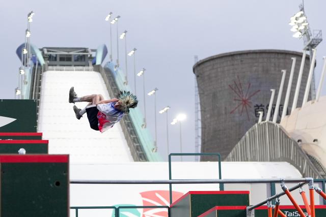 (261031) -- BEIJING, Oct. 31, 2026 (Xinhua) -- Eloan Hitz of France competes during the men's freestyle competition at the Parkour World Cup Beijing 2026 at Shougang Park in Beijing, capital of China, Oct. 31, 2026. (Xinhua/Ju Huanzong)
