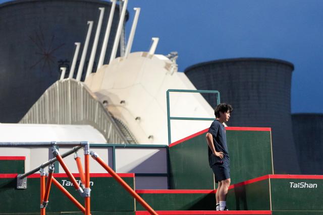 (261031) -- BEIJING, Oct. 31, 2026 (Xinhua) -- Fu Kaige of China reacts during the men's freestyle competition at the Parkour World Cup Beijing 2026 at Shougang Park in Beijing, capital of China, Oct. 31, 2026. (Xinhua/Ju Huanzong)