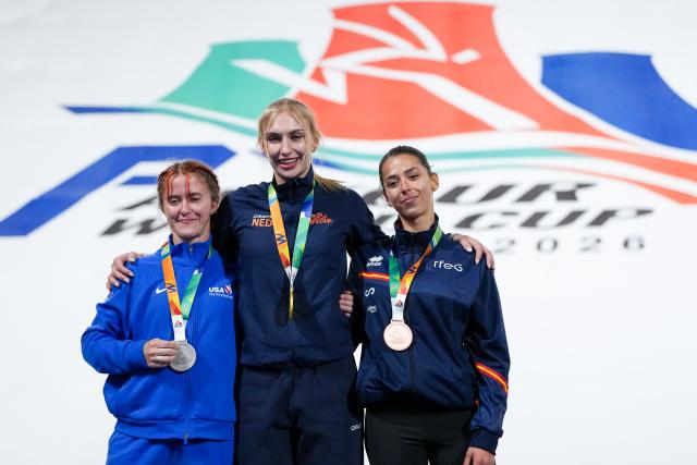 (261031) -- BEIJING, Oct. 31, 2026 (Xinhua) -- Gold medalist Noa Man (C) of the Netherlands, silver medalist Audrey Johnson (L) of the United States and bronze medalist Marta Gutierrez of Spain pose for photos during the awarding ceremony of the women's speed competition at the Parkour World Cup Beijing 2026 at Shougang Park in Beijing, capital of China, Oct. 31, 2026. (Xinhua/Ju Huanzong)