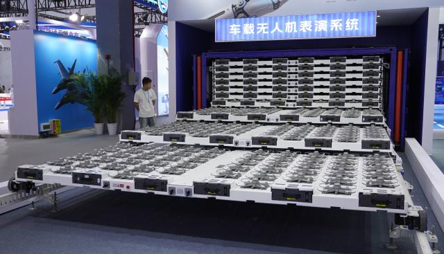 (261031) -- NANCHANG, Oct. 31, 2026 (Xinhua) -- This photo shows a vehicle-mounted drone performance system at the 2026 Nanchang Aviation Industry Expo in Nanchang, east China's Jiangxi Province, Oct. 31, 2026. The expo kicked off here on Saturday, featuring dedicated exhibition areas for three major sectors including aviation manufacturing, commercial spaceflight and the low-altitude economy. The expo covers a total exhibition area of 30,000 square meters, having attracted more than 300 exhibitors. (Xinhua/Zhou Mi)