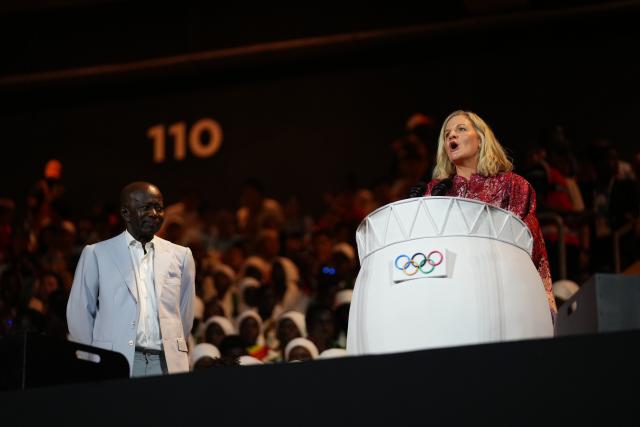 (261031) -- DAKAR, Oct. 31, 2026 (Xinhua) -- Kirsty Coventry (R), president of International Olympic Committee (IOC), speaks during the opening ceremony of the 2026 Youth Olympic Games in Dakar, Senegal, Oct. 31, 2026. (Xinhua/Xie Jianfei)