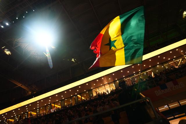 (261031) -- DAKAR, Oct. 31, 2026 (Xinhua) -- National flag of Senegal is seen during the opening ceremony of the 2026 Youth Olympic Games in Dakar, Senegal, Oct. 31, 2026. (Xinhua/Xie Jianfei)