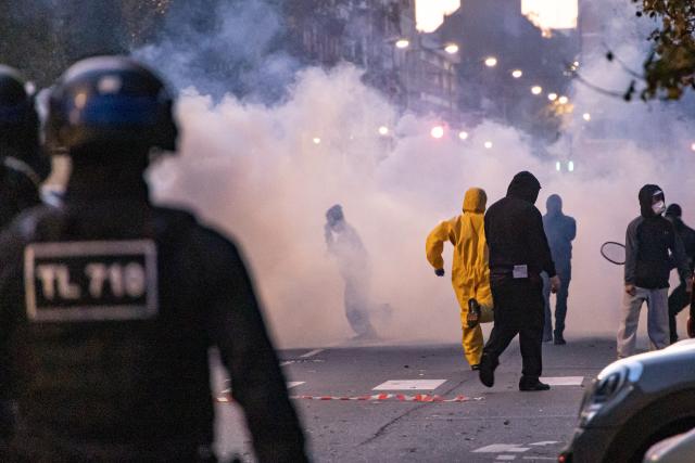 (261031) -- LILLE, Oct. 31, 2026 (Xinhua) -- Protesters run during a protest in Lille, France, Oct. 31, 2026. Around 320,000 people took part in a new round of protests across France on Saturday, according to French daily Le Monde which cited figures from the Interior Ministry. (Photo by Sebastien Courdji/Xinhua)